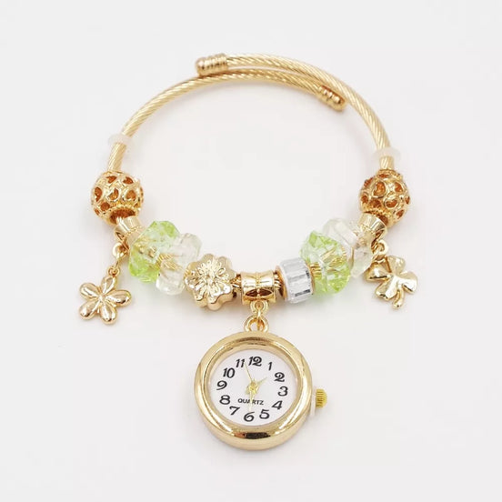 Aukso spalvos apyrankė su laikrodžiu