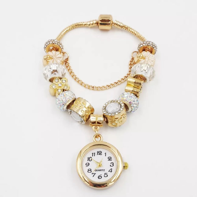 Aukso spalvos apyrankė su laikrodžiu