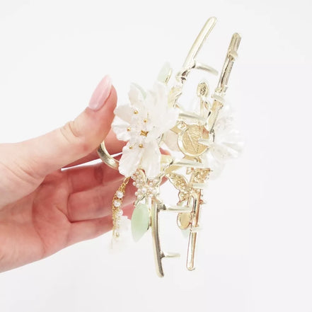 Plaukų segtukas su dideliu gėlės akcentu