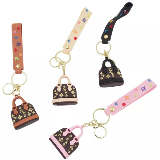 Raktų pakabukas su rankinės formos pakabuku