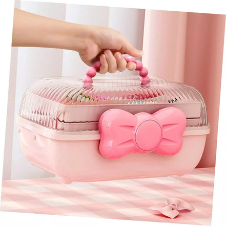 Rožinė papuošalų dėžutė su kaspinu ir rankena