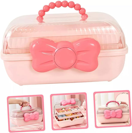 Rožinė papuošalų dėžutė su kaspinu ir rankena