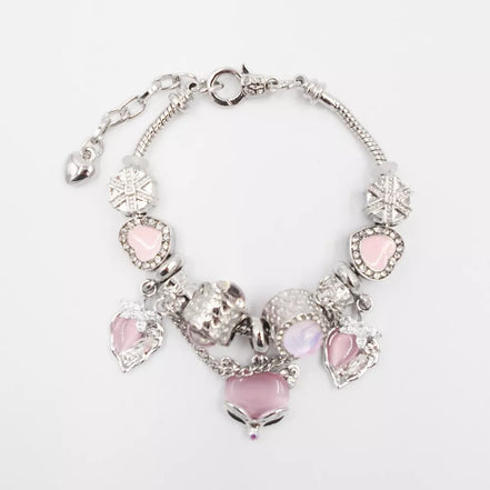 Sidabrinės spalvos apyrankė su šviesiai rožiniais akcentais