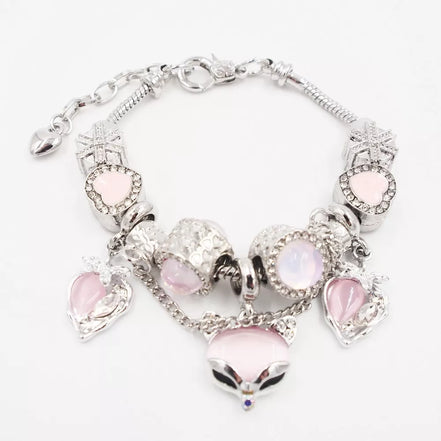 Sidabrinės spalvos apyrankė su šviesiai rožiniais akcentais