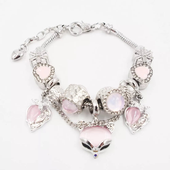 Sidabrinės spalvos apyrankė su šviesiai rožiniais akcentais