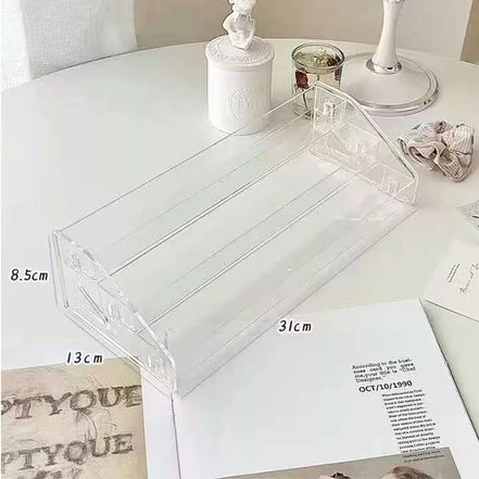 Skaidrus kosmetikos ir buteliukų stovas