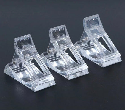 Spaustukai nagų priauginimui