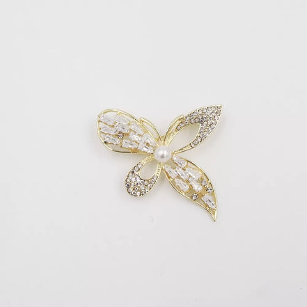 Žėrinti drugelio formos sagė